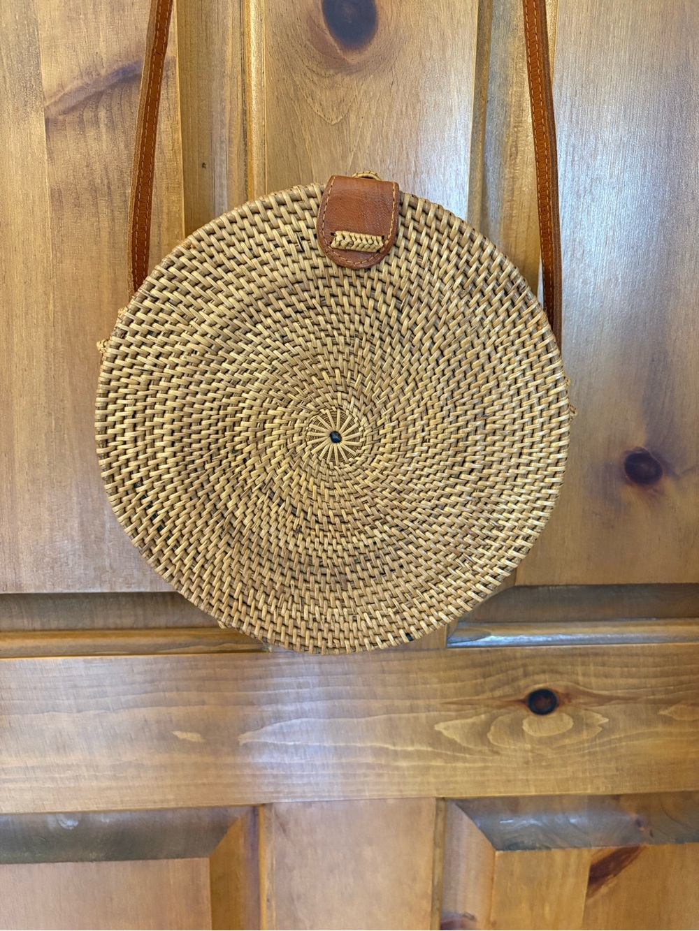 Round Woven Straw Crossbody Bag with Brown Leather Trim
